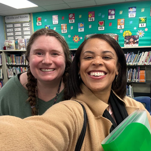 RWB Civics team members at an event in a library